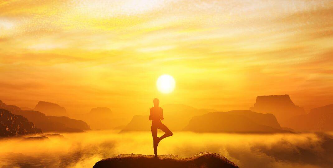 A person doing yoga in a peaceful place