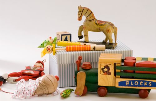 A collage of childhood toys, representing nostalgia and the innocent joys of the inner child.