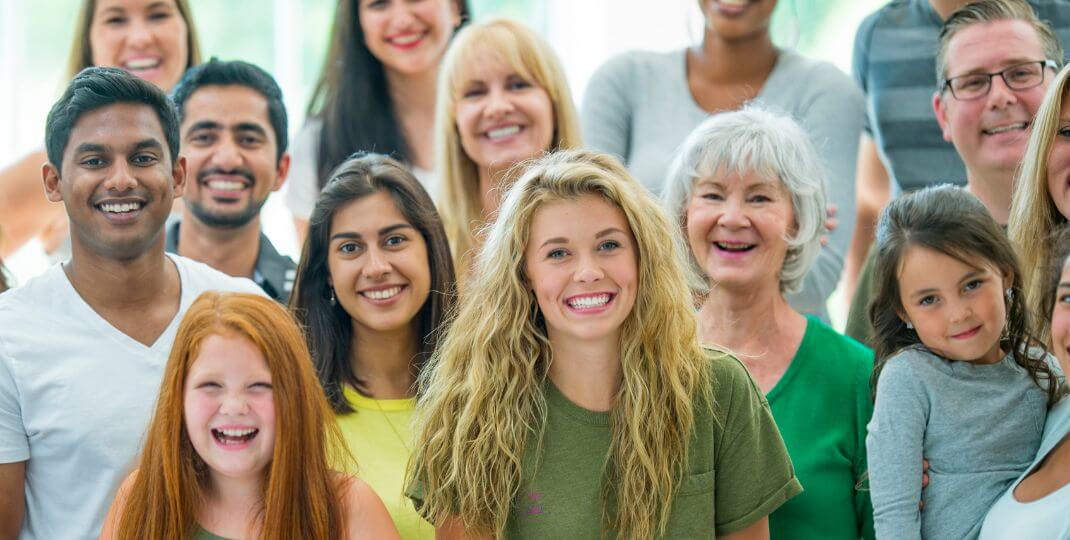 A diverse group of individuals celebrating their bodies and their uniqueness