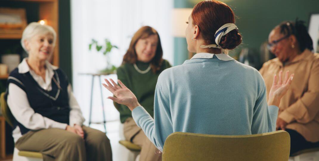 Self-Questioning - A diverse group of people in a supportive discussion circle.